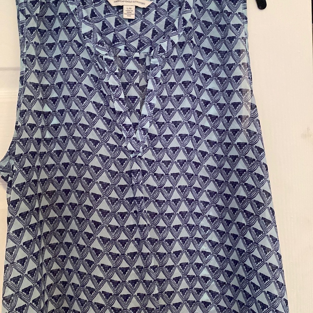 American eagle outfitters  woman’s sleeveless shirt with V-neck size L